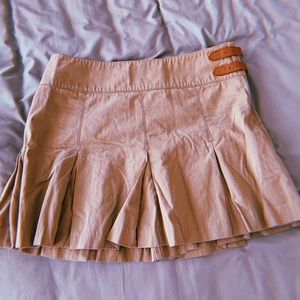 tan khaki skirt with accent buckles on side